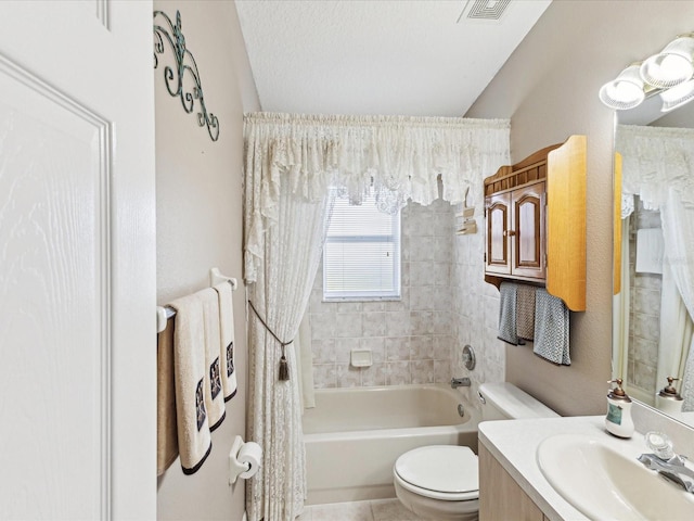 bathroom featuring a textured ceiling, visible vents, toilet, tile patterned floors, and vanity
