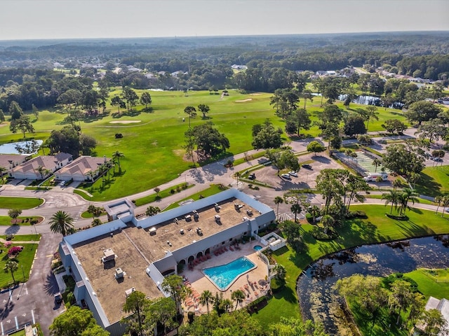 bird's eye view featuring golf course view and a water view