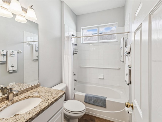 11050 Kiskadee Cir, New Port Richey, FL 34654 - bathroom with shower / tub combo, toilet, vanity, and tile patterned flooring