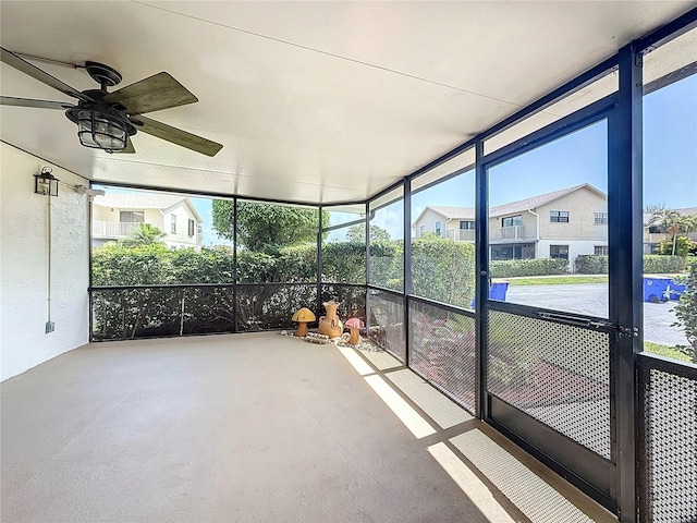 7382 SE Concord Pl, Hobe Sound, FL 33455 - unfurnished sunroom with plenty of natural light and ceiling fan