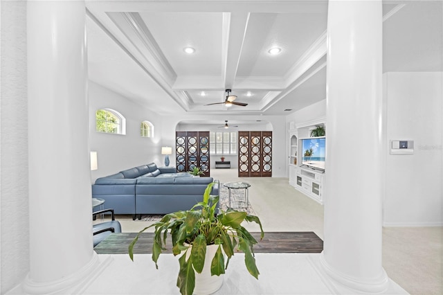 living room with coffered ceiling, a healthy amount of sunlight, carpet flooring, beam ceiling, and a ceiling fan