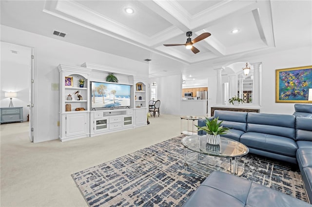living room with coffered ceiling, light colored carpet, decorative columns, ceiling fan, and visible vents