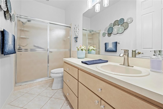 full bathroom with toilet, tile patterned flooring, vanity, and a shower stall