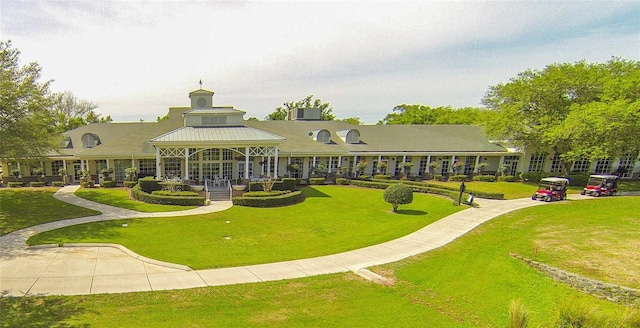 view of community with a yard