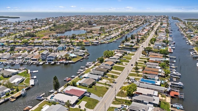 4400 Floramar Ter, New Port Richey, FL 34652 - birds eye view of property featuring a water view and a residential view