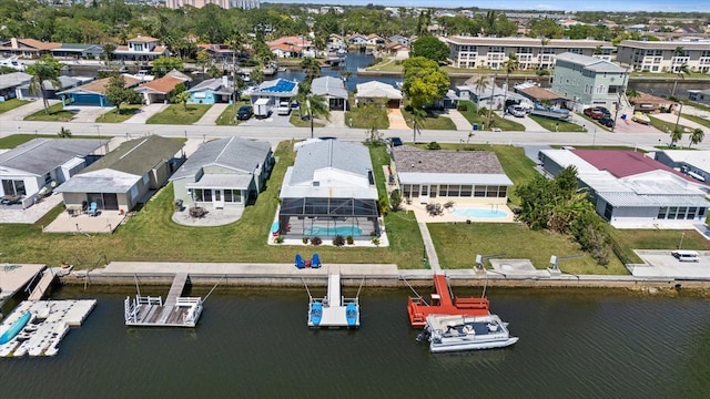 4400 Floramar Ter, New Port Richey, FL 34652 - bird's eye view featuring a water view and a residential view
