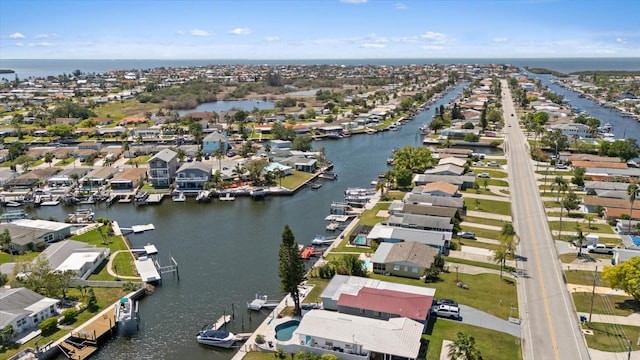 4400 Floramar Ter, New Port Richey, FL 34652 - bird's eye view featuring a water view and a residential view