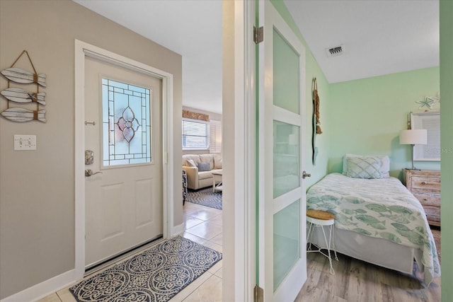 4400 Floramar Ter, New Port Richey, FL 34652 - tiled foyer with baseboards and visible vents