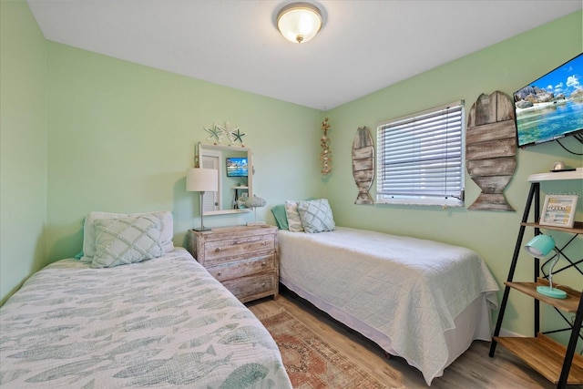 4400 Floramar Ter, New Port Richey, FL 34652 - bedroom featuring wood finished floors