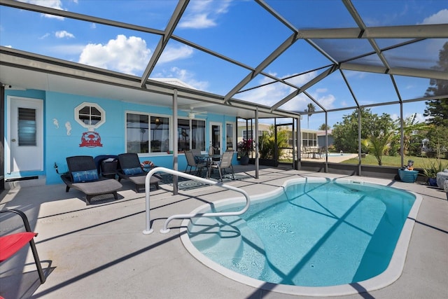4400 Floramar Ter, New Port Richey, FL 34652 - view of swimming pool featuring a patio and a lanai