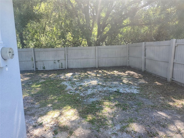 825 Lincoln Ave, Tarpon Springs, FL 34689 - view of yard with a fenced backyard