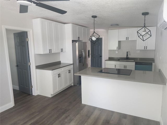 825 Lincoln Ave, Tarpon Springs, FL 34689 - kitchen with white cabinets, a sink, dishwashing machine, stainless steel fridge with ice dispenser, and black electric stovetop