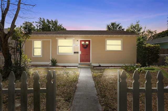 1309 45th St S, Saint Petersburg, FL 33711 - view of front of house featuring fence and roof with shingles