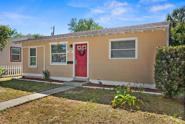 1309 45th St S, Saint Petersburg, FL 33711 - bungalow featuring fence and a front lawn