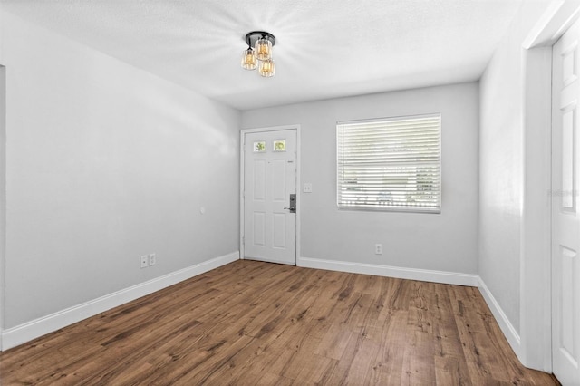 1309 45th St S, Saint Petersburg, FL 33711 - interior space with baseboards and wood finished floors