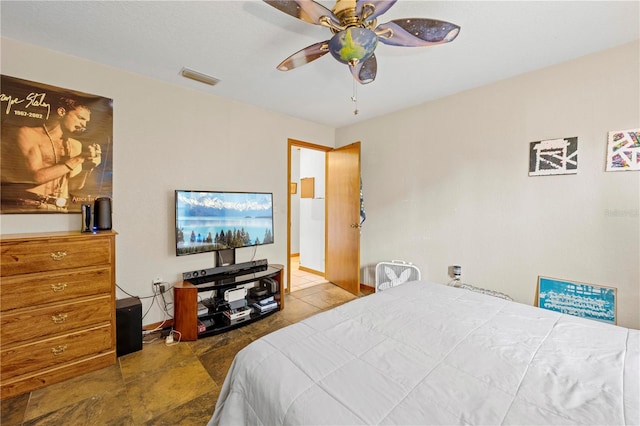 bedroom featuring ceiling fan and visible vents