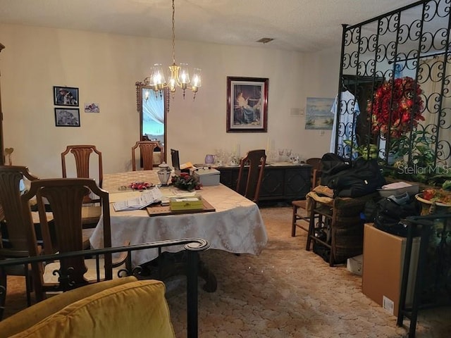 carpeted dining space with a notable chandelier and visible vents