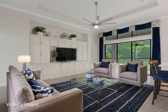 877 N Hunt Club Dr, Hernando, FL 34442 - living room with a raised ceiling, light tile patterned floors, and a ceiling fan