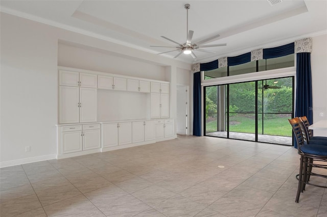 877 N Hunt Club Dr, Hernando, FL 34442 - interior space featuring a tray ceiling, ceiling fan, and baseboards