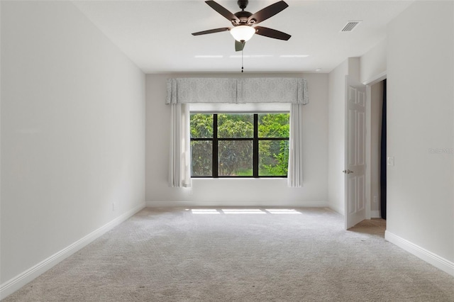 877 N Hunt Club Dr, Hernando, FL 34442 - unfurnished room featuring carpet, visible vents, baseboards, and a ceiling fan