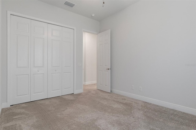 877 N Hunt Club Dr, Hernando, FL 34442 - unfurnished bedroom featuring visible vents, baseboards, a closet, and carpet floors