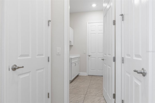 877 N Hunt Club Dr, Hernando, FL 34442 - bathroom featuring tile patterned flooring, vanity, and baseboards