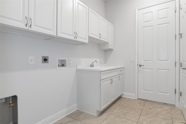877 N Hunt Club Dr, Hernando, FL 34442 - laundry area featuring hookup for a washing machine, hookup for an electric dryer, a sink, baseboards, and cabinet space
