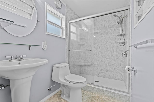 155 Patty Ann Blvd, Palm Harbor, FL 34683 - bathroom with a shower stall, a sink, baseboards, and toilet