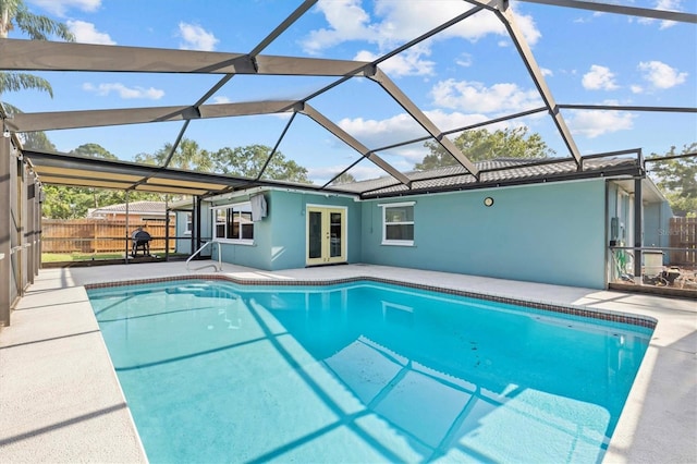 155 Patty Ann Blvd, Palm Harbor, FL 34683 - view of pool featuring fence, a patio, french doors, a fenced in pool, and a lanai