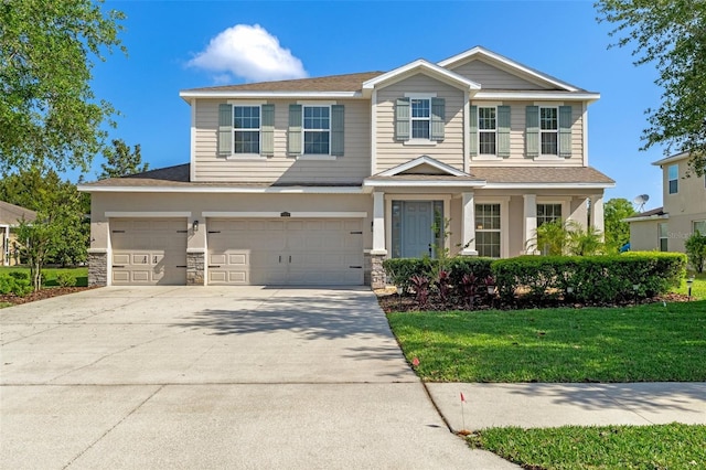 13619 Hunters Point St, Spring Hill, FL 34609 - craftsman house with an attached garage, stone siding, driveway, and a front lawn
