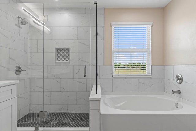 13619 Hunters Point St, Spring Hill, FL 34609 - bathroom with a stall shower, a garden tub, and vanity