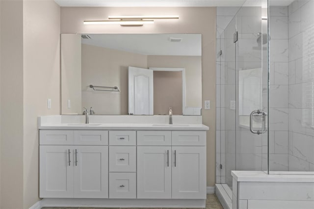 13619 Hunters Point St, Spring Hill, FL 34609 - full bath with a sink, double vanity, and a stall shower