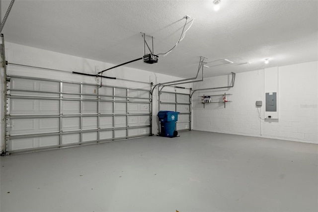 13619 Hunters Point St, Spring Hill, FL 34609 - garage with electric panel, a garage door opener, and concrete block wall