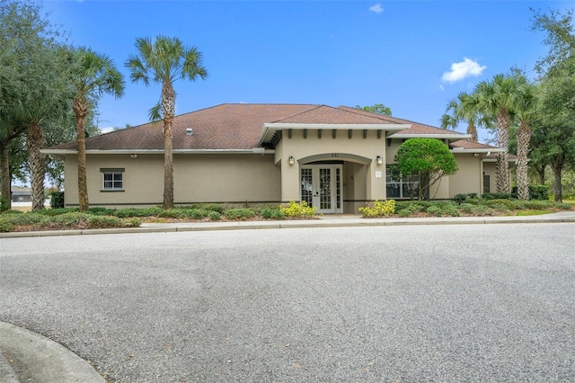 13619 Hunters Point St, Spring Hill, FL 34609 - mediterranean / spanish house with french doors and stucco siding