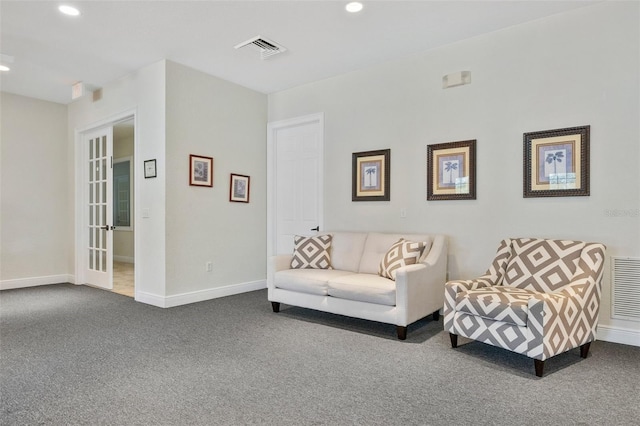 13619 Hunters Point St, Spring Hill, FL 34609 - living room with carpet flooring, baseboards, visible vents, and recessed lighting