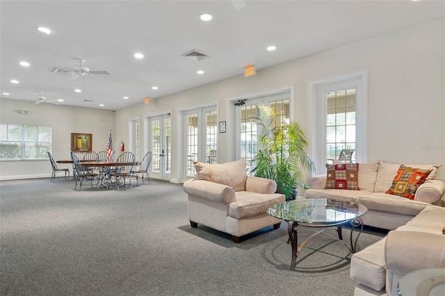 13619 Hunters Point St, Spring Hill, FL 34609 - carpeted living room with visible vents, recessed lighting, and plenty of natural light