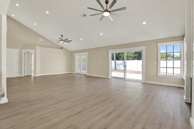 10423 Ashley Oaks Dr, Riverview, FL 33578 - unfurnished living room featuring light wood-style flooring, baseboards, visible vents, a ceiling fan, and high vaulted ceiling