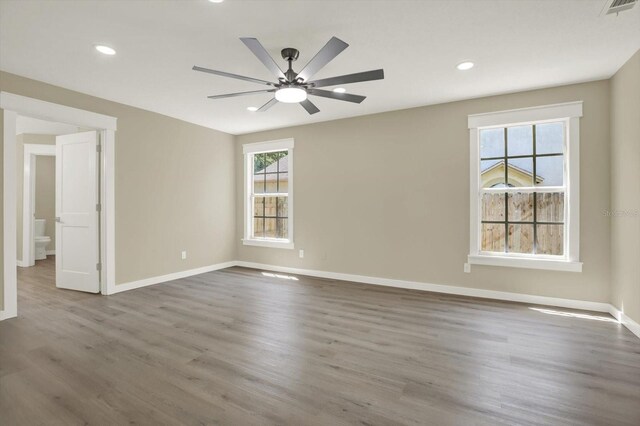 10423 Ashley Oaks Dr, Riverview, FL 33578 - unfurnished room featuring recessed lighting, wood finished floors, visible vents, baseboards, and ceiling fan