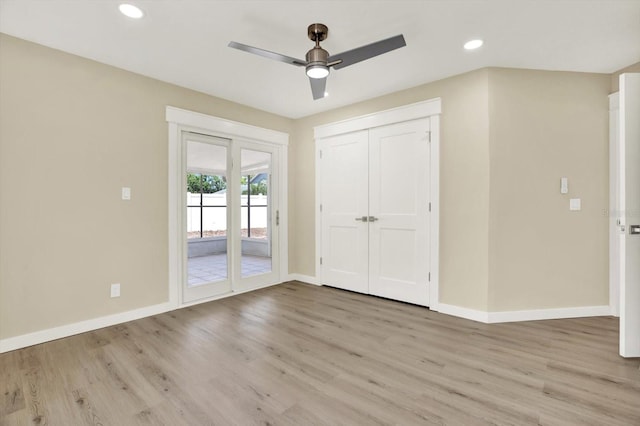 10423 Ashley Oaks Dr, Riverview, FL 33578 - unfurnished bedroom with recessed lighting, baseboards, access to outside, and light wood-style flooring