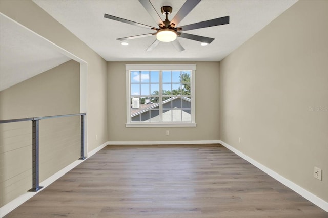 10423 Ashley Oaks Dr, Riverview, FL 33578 - unfurnished room with wood finished floors, baseboards, and ceiling fan