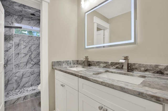 10423 Ashley Oaks Dr, Riverview, FL 33578 - full bathroom featuring double vanity, a marble finish shower, and a sink