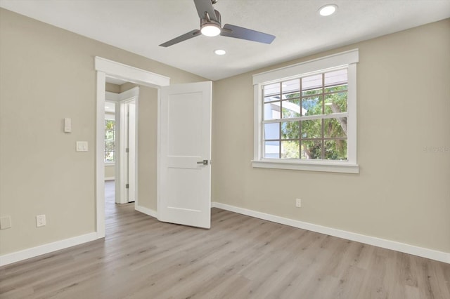 10423 Ashley Oaks Dr, Riverview, FL 33578 - interior space featuring baseboards, light wood finished floors, and recessed lighting