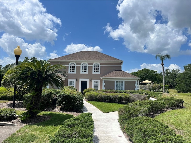 10423 Ashley Oaks Dr, Riverview, FL 33578 - mediterranean / spanish-style home featuring a front yard and stucco siding