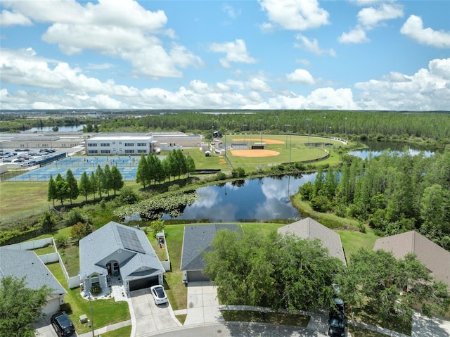 birds eye view of property with a water view