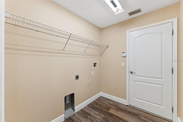 washroom with hookup for an electric dryer, baseboards, dark wood-type flooring, laundry area, and hookup for a washing machine