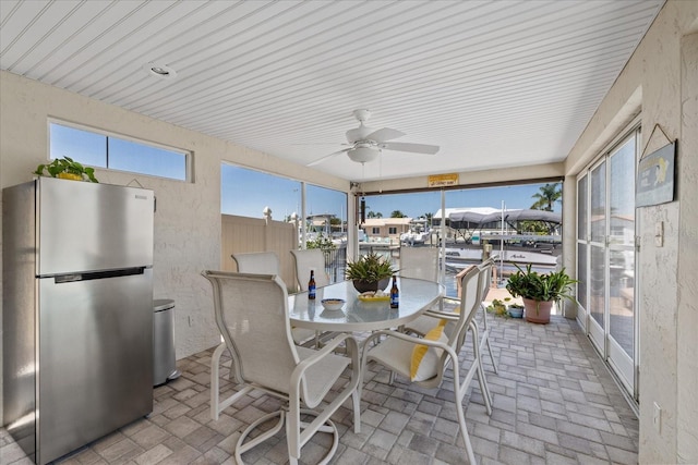 5033 Cabrilla Ct, New Port Richey, FL 34652 - sunroom / solarium with brick patterned floors and plenty of natural light