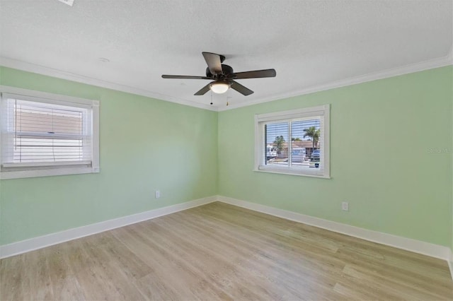 5033 Cabrilla Ct, New Port Richey, FL 34652 - empty room with light wood-style floors, ornamental molding, and a ceiling fan