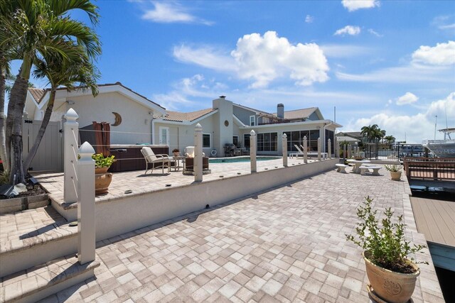5033 Cabrilla Ct, New Port Richey, FL 34652 - view of patio / terrace featuring a gate