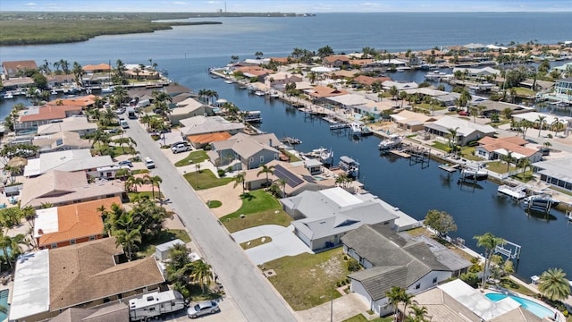 5033 Cabrilla Ct, New Port Richey, FL 34652 - aerial perspective of suburban area with a nearby body of water