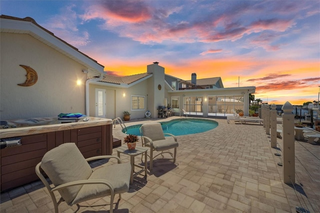5033 Cabrilla Ct, New Port Richey, FL 34652 - view of swimming pool with an outdoor hot tub, a patio area, and grilling area
